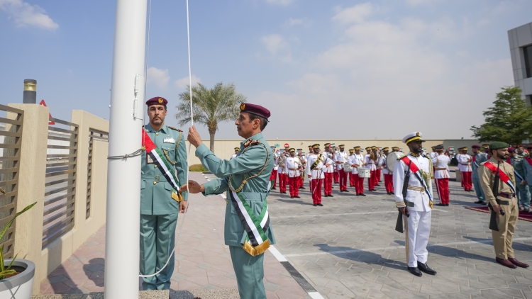 شرطة عجمان تجدد الولاء والانتماء في يوم العلم الإماراتي